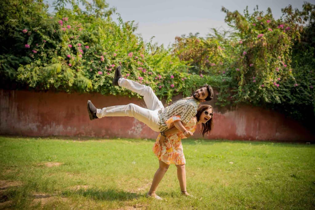 Candid couple laughing together during Jaipur wedding celebration